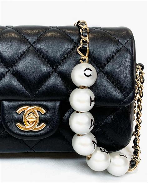 chanel bag with pearl chain.